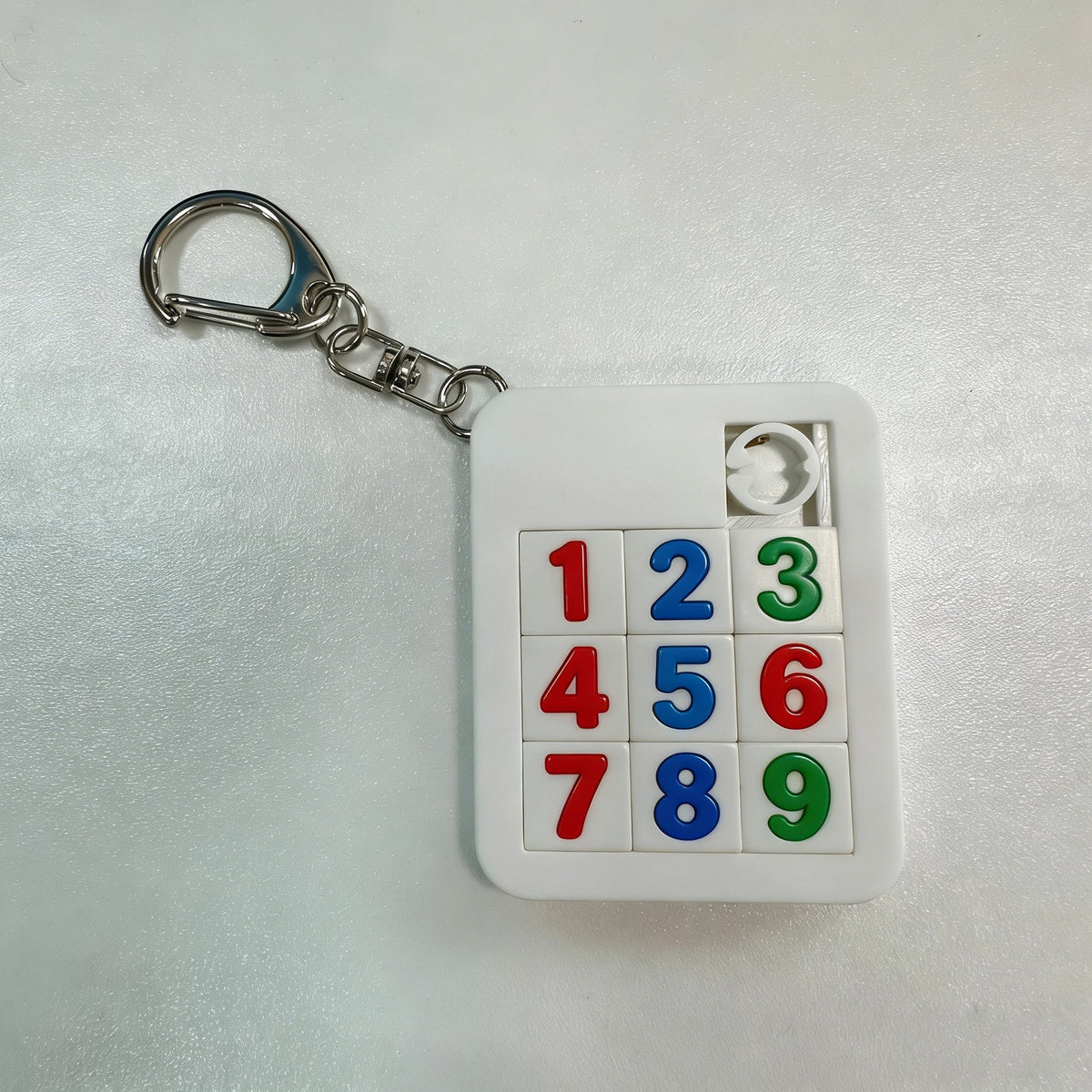 Sliding Scramble Puzzle W/ Keychain - 9 pieces
